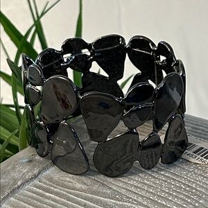 Macy's metal abstract stretch Bracelet NEW very shiny blackish color